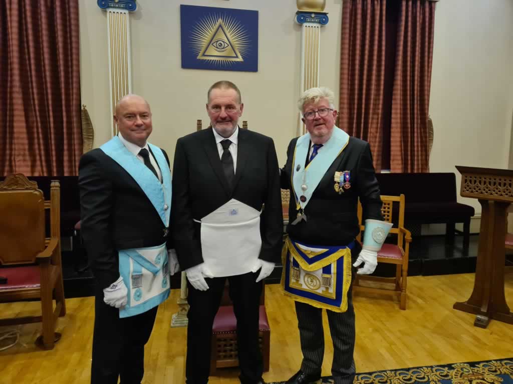 Initiate Ian Craven (centre).